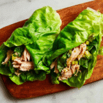 Turkey & Veggie Lettuce Wraps on a rustic board