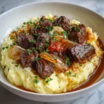Slow-Simmered Garlic Butter Beef Tips with Creamy Mashed Potatoes